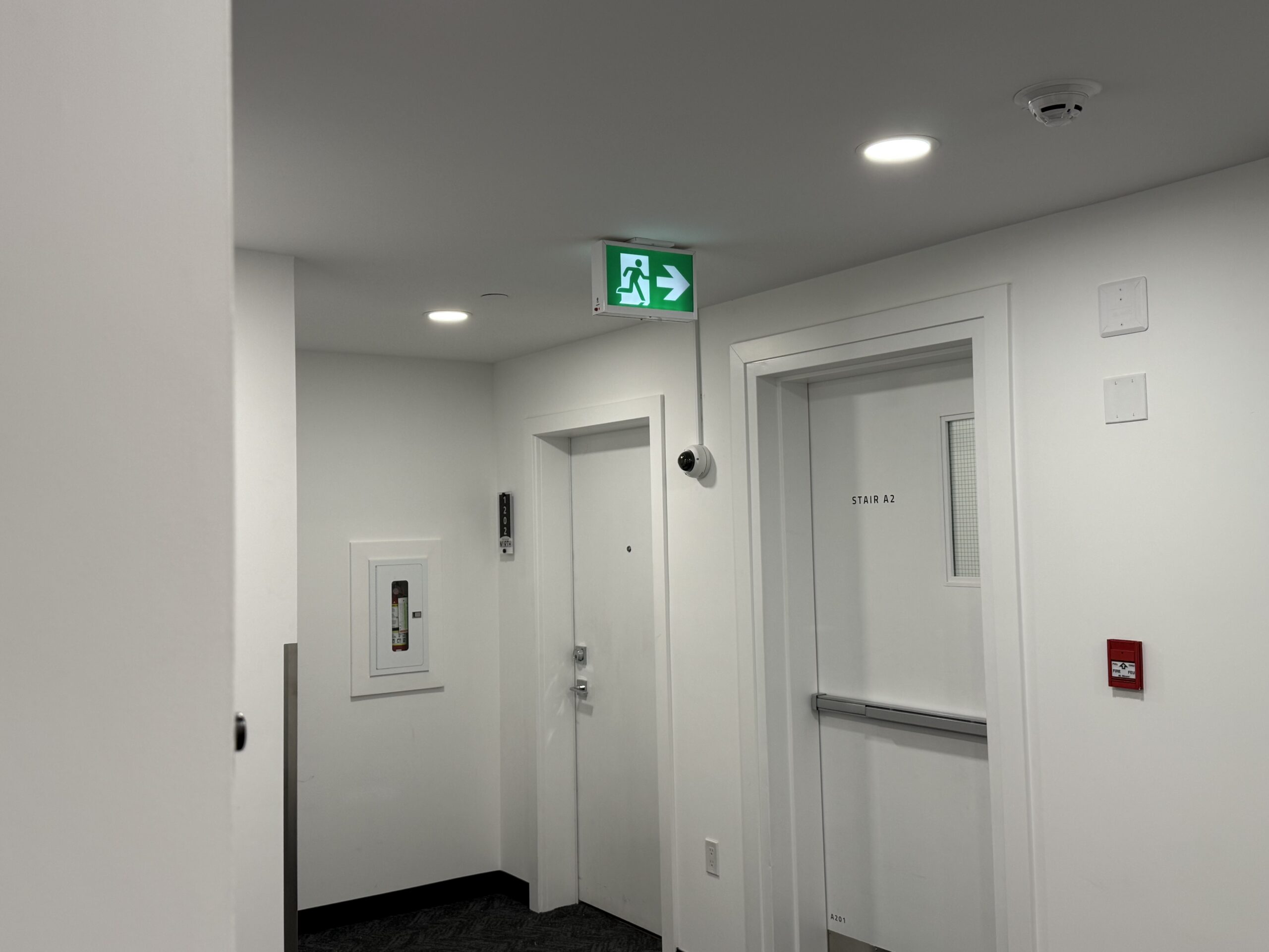 Clean corridor security camera installation by Truesight Security in Calgary